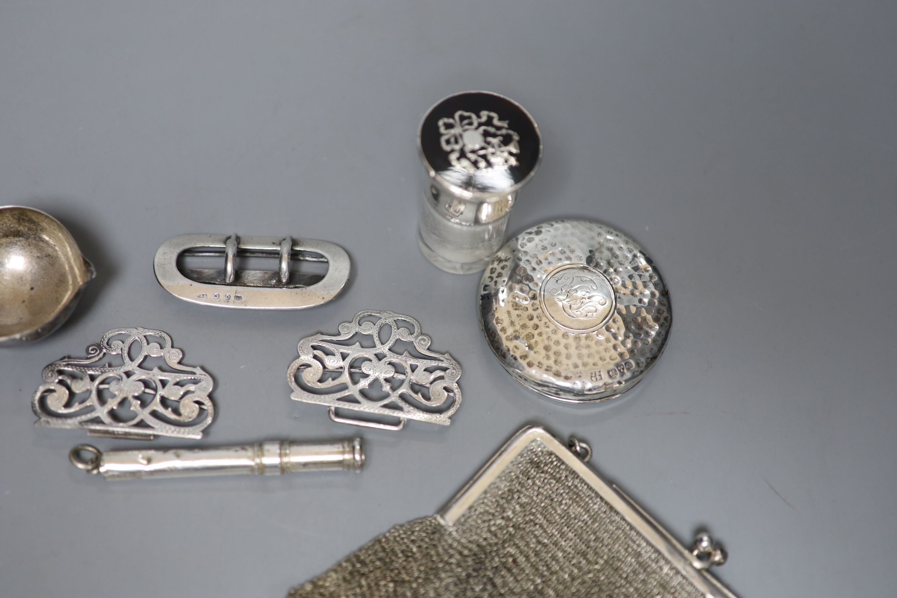 A group of small silver including mesh evening bag, buckles, salts bottle etc.